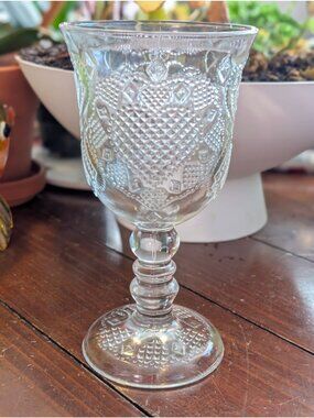 1978 Avon glass goblet produced by Fostoria in the "Hearts and Diamonds" pressed